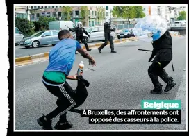  ??  ?? Belgique À Bruxelles, des affronteme­nts ont opposé des casseurs à la police.