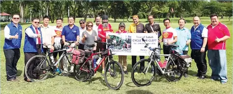  ??  ?? Baldape Singh, Karam Singh and Gurdev Singh started their 1,500km journey across Sabah on their bicycles yesterday in an effort to raise funds for children born with cleft lips and palate birth defects. They started from the state capital and will...