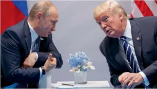  ?? AP file ?? Russian President Vladimir Putin with his US counterpar­t Donald Trump at the G20 Summit in Hamburg, Germany. —