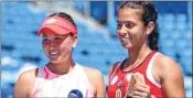  ??  ?? Ankita Raina (R) along with her doubles partner Kamilla Rakhimova