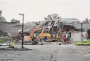  ?? Brian A. Pounds/Hearst Connecticu­t Media ?? Demolition is underway on the former Testo’s Restaurant on Madison Avenue in Bridgeport on July 26.