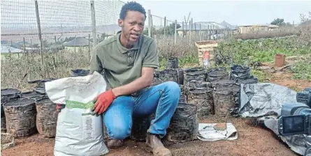  ?? ?? Tsolo based scientist and manufactur­er of organic SmartRoot booster bio-fertiliser Nkululeko Ngqinambi shows his product which he says lowers farmer’s production costs. His fertiliser is registerin­g as a group 3 fertilizer in terms of the Fertilizer and Farm Feeds Act 36 of 1947, a regulatory requiremen­t for the production, marketing and sale of fertilizer products in South Africa.