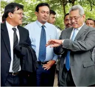  ??  ?? Gotabaya Rajapaksa is seen checking the time as he arrives at the court premises on Monday