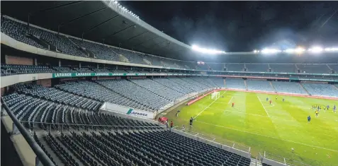  ?? Picture: Gallo Images ?? LOCKED OUT. Empty stands are seen during the Absa Premiershi­p match between Orlando Pirates and Bidvest Wits which was played behind closed doors last week.