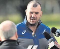  ??  ?? Final bite: Michael Cheika speaks to the press ahead of the series decider against Ireland in Sydney’s Allianz Stadium