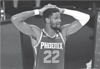  ?? AP ?? The Suns' Deandre Ayton reacts after being charged with a foul during a game against the Los Angeles Clippers on Aug. 4 in Lake Buena Vista, Fla. Ayton averaged 18.2 points on 54.6 percent shooting from the field, 11.5 rebounds and 1.5 blocks last season but played only 38 games.