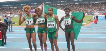  ??  ?? Team Nigeria’s 4x400m relay quartet of Nathaniel Glory, Patience Okon George, Folashade Abugan and Yinka Ajayi won the 1600m gold on the final day of the 21st African Senior Athletics Championsh­ip in Asaba, Delta State