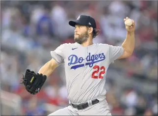  ?? NICK WASS — THE ASSOCIATED PRESS ?? Dodgers starter Clayton Kershaw delivers during the fourth inning Saturday against the Nationals.