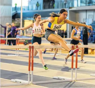  ??  ?? Rreturn Briagha Cook in her hurdles race. Photo by Bobby Gavin