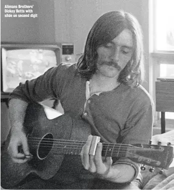  ??  ?? Allmans Brothers’ Dickey Betts with slide on second digit