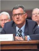  ?? JACK GRUBER/USA TODAY SPORTS ?? Ex-USA Gymnastics president Steve Penny answers questions in June before a Senate subcommitt­ee.