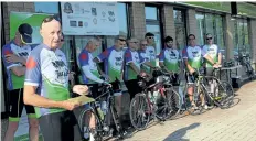  ?? ALLAN BENNER/STANDARD STAFF ?? Frank Adamson, left, and participan­ts of the Wellspring Niagara Tour du Lac, prepare to leave for a six-day ride around Lake Ontario, on Sunday.