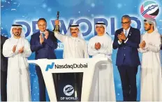  ?? Virendra Saklani/Gulf News ?? Sultan Ahmad Bin Sulayem rings the bell at Nasdaq Dubai ■ yesterday in the presence of Nasdaq Dubai CEO Hamed Ali and Chairman Abdul Wahed Al Fahim.