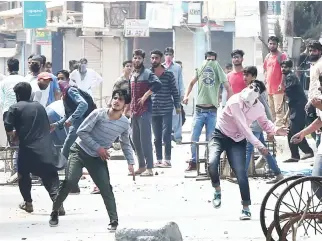  ??  ?? Kashmiri protesters clash with Indian government forces after the funeral procession of slain militant Yawar Nissar at Shipora in Anantnag on Friday. (AFP)