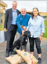  ?? PICTURE / DEBBIE BEADLE ?? Andy Milne (deputy National Commission­er, Department of Correction­s), John Logie (SPCA), Donna Blake (Community Correction­s) and an unnamed road tester with a couple of the Probation dog beds.