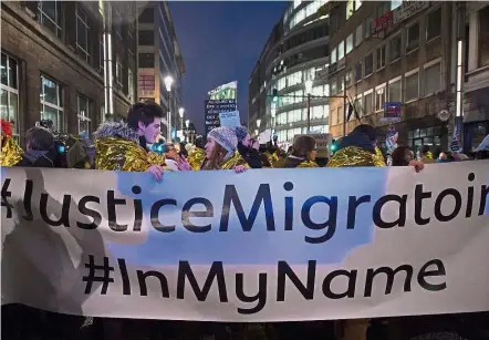  ?? — Reuters ?? Show of support: People take to the streets to support a new EU migration policy, a day before an EU leaders’ meeting, in Brussels, Belgium on Dec 13.