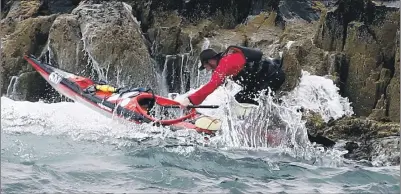  ?? Photos: Stephen Lawson ?? ON THE ROCKS: Peter Mackman from Nairn required to be rescued after being thrown on to the rocks by the waves