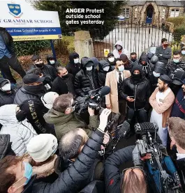  ??  ?? ANGER Protest outside school gates yesterday