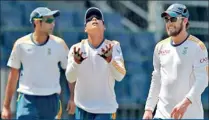  ??  ?? AB de Villiers, Quiton de Kock and Imran Tahir are seen at the practice yesterday at the R Premadasa Stadium. AFP