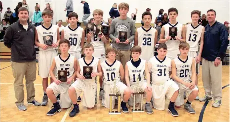  ??  ?? The Gordon Lee Middle School Trojans followed up their NGAC Western Division championsh­ip by winning the NGAC Tournament on Saturday with a 27-26 win over Heritage. (Messenger photo/Scott Herpst)