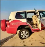  ??  ?? balancing act: Gareth’s car on a dune, the Sheikh Zayed Grand Mosque, and Gareth with a friendly camel