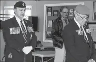  ?? NIKKI SULLIVAN/CAPE BRETON POST ?? Retired RCMP officer James Leadbeater, left, and Royal Canadian Legion branch 15 president Tom White, bow their heads in honour of all soldiers who fought on D-Day in 1944 during the D-Day ceremony on Wednesday.