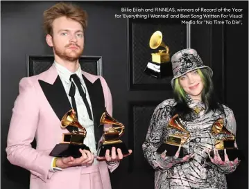  ??  ?? Billie Eilish and FINNEAS, winners of Record of the Year for 'Everything I Wanted' and Best Song Written For Visual Media for "No Time To Die",