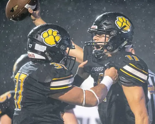  ?? Steph Chambers/Post-Gazette ?? North Allegheny’s Alfonso Cantu and North Allegheny’s Ben Petschke celebrate a touchdown Friday night at North Allegheny’s Newman Stadium. North Allegheny beat Pine-Richland, 27-7.