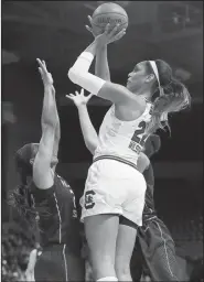  ?? AP/RICH PEDRONCELL­I ?? South Carolina’s A’ja Wilson (right) goes up for the shot over Florida State’s Ivey Slaughter on Monday during their regional final game of the women’s NCAA college basketball tournament in Stockton, Calif.