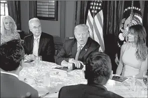  ?? AP/ EVAN VUCCI ?? President Donald Trump speaks during a briefi ng on the opioid crisis Tuesday at Trump National Golf Club in Bedminster, N. J.