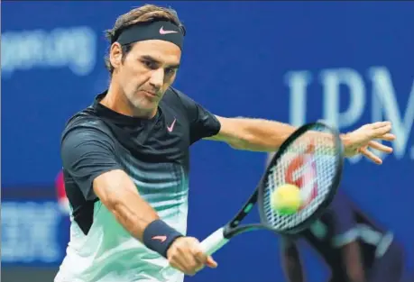  ?? AFP ?? Roger Federer returns to Feliciano Lopez during their third round US Open match at the Billie Jean King National Tennis Center, New York on Saturday.