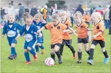  ??  ?? Napier City Rovers and Masonvale junior footballer­s (sixth grade girls’ only league) at the Unison Junior Football Tournament earlier this year.