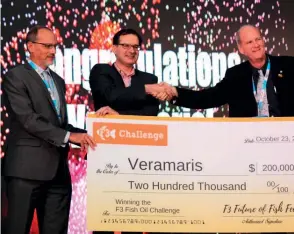  ??  ?? Above: Veramaris CEO Karim Kurmaly (centre) accepts the prize money