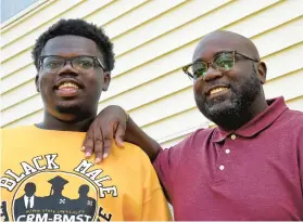  ?? BARBARA HADDOCK TAYLOR/BALTIMORE SUN ?? Anthone Bond, right, has been a teacher for 29 years. His son Zaire, left, is participat­ing in a program that helps prepare Black men for careers as teachers.
