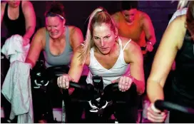  ?? ?? After more than two years of working out in a basement or a converted home office, many people are more than ready to return to in-person workouts in gyms and fitness studios. For gyms that made it through the worst, signs of stability are afoot, according to industry groups.