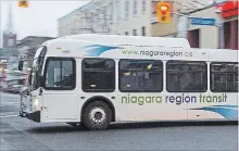  ?? JULIE JOCSAK TORSTAR FILE PHOTO ?? A Niagara Region Transit bus makes its way along Carlisle Street in downtown St. Catharines.