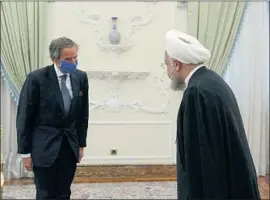  ?? Iranian Presidency Office ?? IRANIAN President Hassan Rouhani, right, welcomes Rafael Mariano Grossi of the Internatio­nal Atomic Energy Agency during a meeting last year in Tehran.