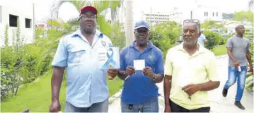  ?? ?? St James taxi operators (from left) Lyndol Bowen, Raltson Allen and Glenford Allen posed for a photograph after their free prostate screenings on Friday.