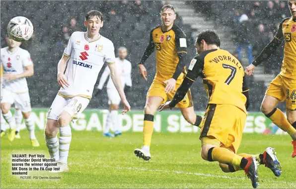 ?? PICTURE: PSI/ Dennis Goodwin ?? VALIANT: Port Vale midfielder David Worrall scores the winner against MK Dons in the FA Cup last weekend
