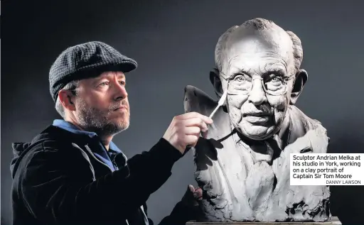  ?? DANNY LAWSON ?? Sculptor Andrian Melka at his studio in York, working on a clay portrait of Captain Sir Tom Moore