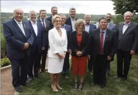  ?? JASON FRANSON, THE CANADIAN PRESS ?? Premiers pose for a group photo during the Council of Federation meetings in Edmonton Alta, on Tuesday, where the issue of a trade deal with the U.S. was discussed.