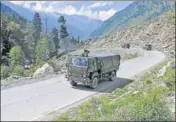  ??  ?? Army trucks on their way to Ladakh on Thursday.