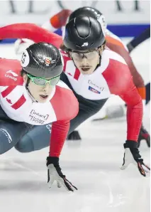  ?? JEFF MCINTOSH/THE CANADIAN PRESS ?? Two of Canada’s young stars in men’s short track speedskati­ng, Charle Cournoyer, left, and Samuel Girard, will be looked to as possible leaders once Charles Hamelin retires.