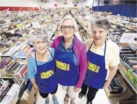  ?? TROY FLEECE ?? Margo Embury, from left, Janet Drummond and Bev Barlow are three of the seven volunteer co-ordinators for The Big Book Sale, put on by the Seniors’ University Group. Thousands of books, CDS, DVDS, records and games are up for sale at the event, which runs Thursday through Saturday.