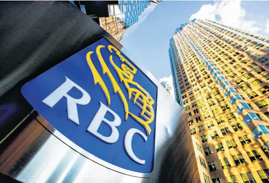  ?? REUTERS ?? A Royal Bank of Canada (RBC) logo is seen on Bay Street in the heart of the financial district in Toronto.