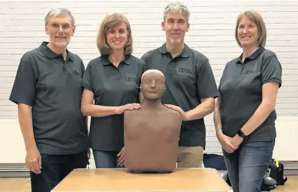  ??  ?? &gt;The CPR Counts team of (from left) Malcolm Robinson with course assistant Barbara Caine, Mike Bennett, lead resuscitat­ion officer for Birmingham Community Healthcare NHS Trust, and course assistant Dawn Caine