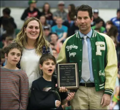  ??  ?? Coach Jody Benson was inducted into the Nebo Athletic Hall of Fame in February at the Payson High School boys basketball game.