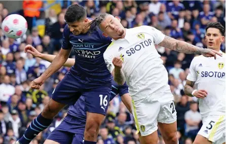  ?? EPA ?? Power and the glory: Rodri (left) beats Phillips to Foden’s free-kick and heads City into the lead