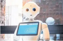  ?? 123RF ?? A Pepper robot assistant which uses Japanese humanoid technology.