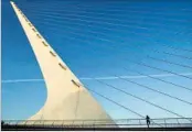  ?? Sacramento Bee MCT via Getty Images ?? WALK or bike the Sundial Bridge after lunch.